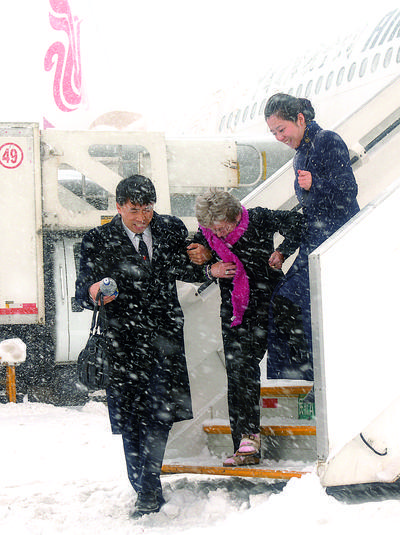 堅持四心服務 風雨無阻。王澤民攝