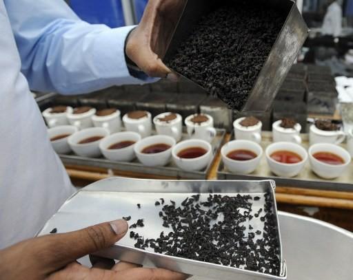 商品續挫 賣壓恐持續至2015年      (圖:AFP)