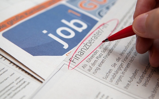 The logo of GlaxoSmithKline is seen on its office building in Shanghai