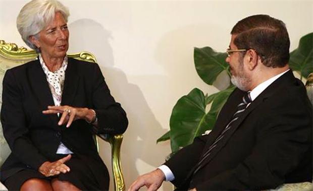 IMF總裁拉加德(Christine Lagarde)和埃及前總統穆西(Mohammed Mursi)會面