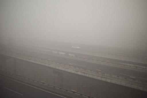 霧霾深鎖的北京(圖:AFP)