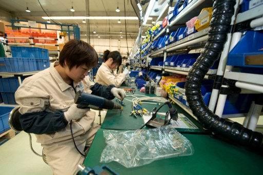 中國調降2015年工業生產成長目標至8%      (圖:AFP)