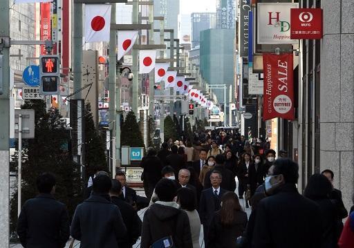 OECD指出日本需要結構性改革來振興經濟 (圖: AFP)