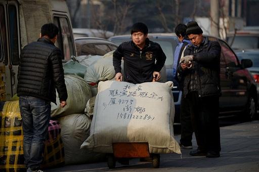 中國GDP已觸底 未來可望反彈 (圖: AFP)