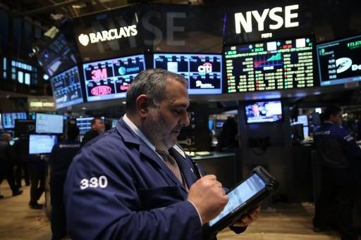 油、美元、營收三大衝擊 納斯達克成焦點      (圖:AFP)