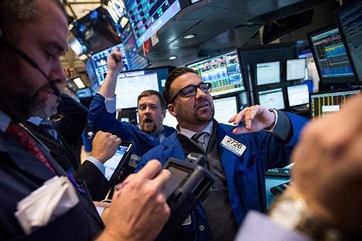 專家認為債市泡沫化的情形恐比股市嚴重 (圖: AFP)