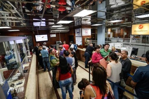 匯率與債市將觸發危機      (圖:AFP)