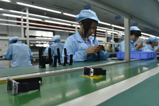 中國首季GDP達7%引發外界質疑 (圖: AFP)