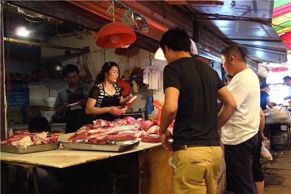 近來中國豬肉價格上漲(圖：AFP)