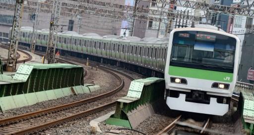 通勤族眾多的東京 是否能順利接納奧運觀光人潮 日本政府嚴正以待(圖:AFP)