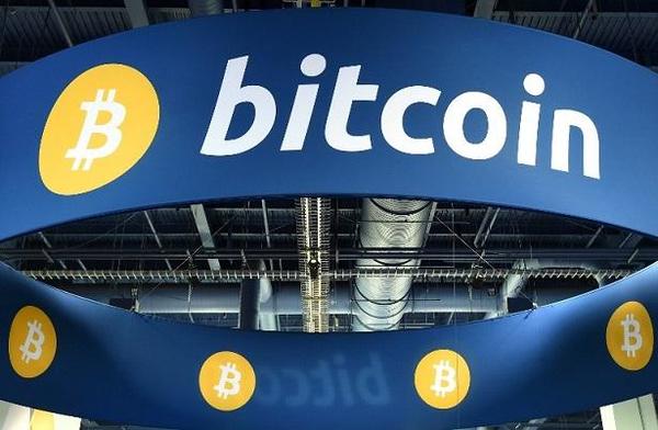 比特幣符號。(圖:AFP)