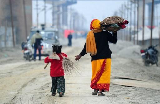 職業婦女 讓小孩學習更多獨立自主的技巧 (圖:AFP)