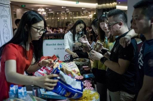 中國6月份服務業PMI降至51.8      (圖:AFP)