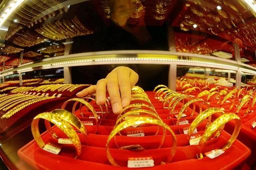 金價連跌10天創下近20年來最長紀錄 (圖: AFP)
