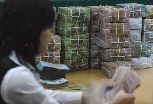 越南周三宣佈擴大越南盾交易區間      (圖:AFP)