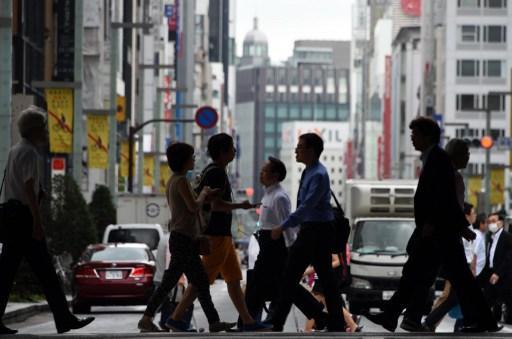 儘管日本第 2 季 GDP 萎縮 1.6% ，財相依舊看好經濟前景。 (圖:AFP)