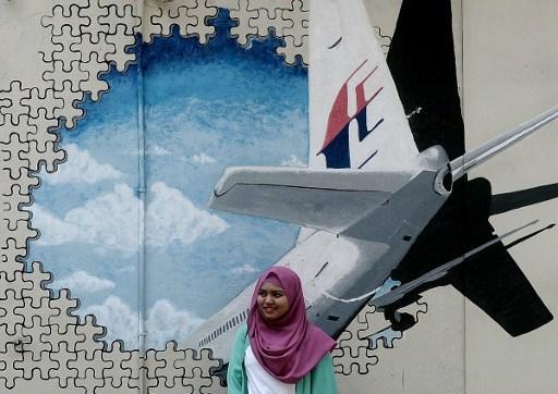 馬航MH370失事的壁畫(圖:AFP)