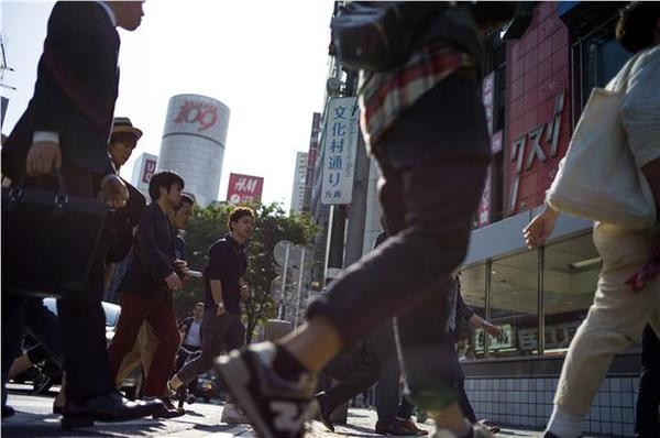 日本政府上修去年第 4 季 GDP 。 (圖:AFP)