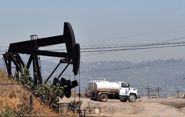 油企 SandRidge 曾於 3 月暗示聲請破產，如今已然應驗。 (圖:AFP)