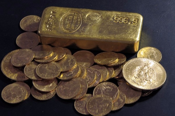 當前全球危機頻仍，黃金價格跟著水漲船高。 (圖:AFP)