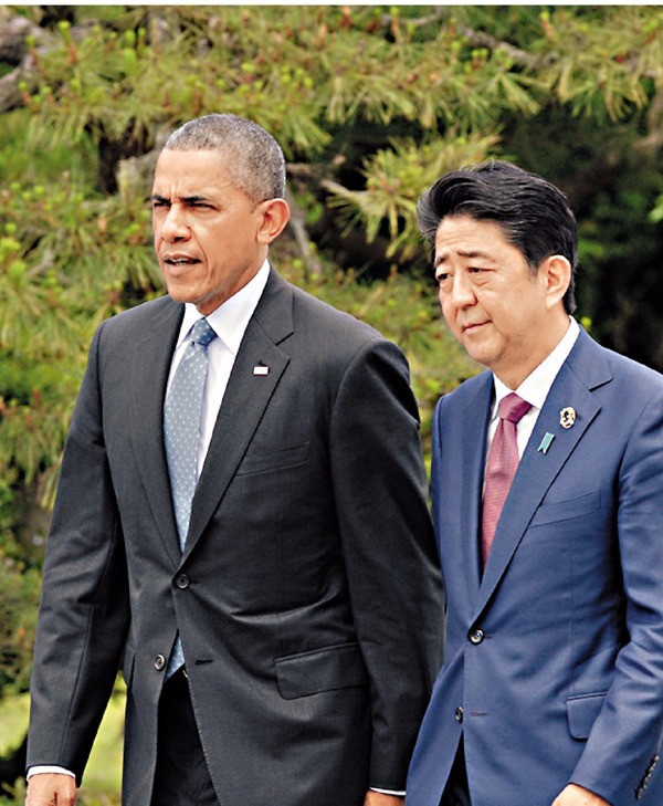 日本首相安倍晉三、美國總統歐巴馬在七國集團(G7)首腦活動上。 圖片來源:香港文匯報