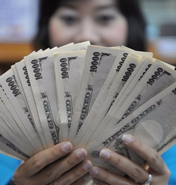 日元昨(15)日一度升至100.9兌1美元。 (圖：AFP)