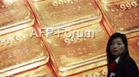 圖:AFP 黃金價格週五上漲