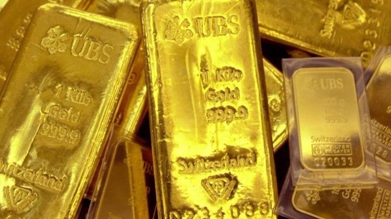 地緣政治緊張升溫，金價突破每盎司1290美元。  (圖：AFP)