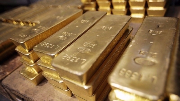 美元走低，黃金收高      （圖:AFP）