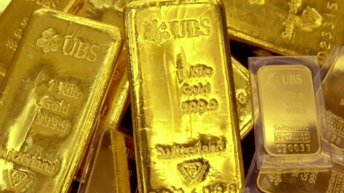 分析師表示，黃金1300美元附近是「買入」機會。 ( 圖：AFP)