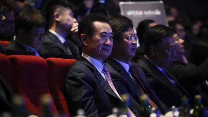 萬達集團董事長王健林(前排左)