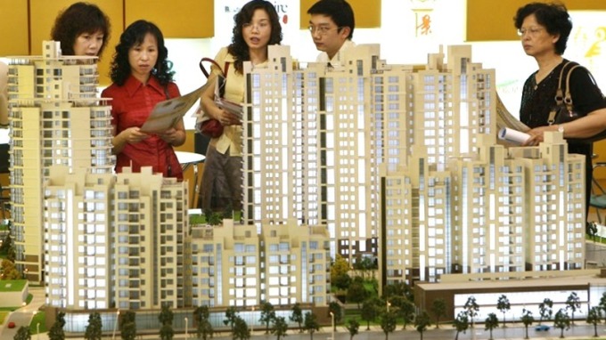 明年中國房地產商債務高達人民幣3850億元。