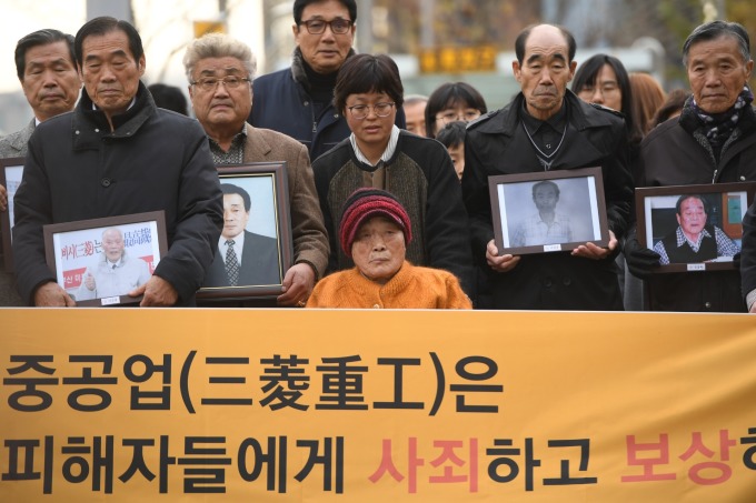 日韓因二戰徵用工問題摩擦不斷 (圖片:AFP)