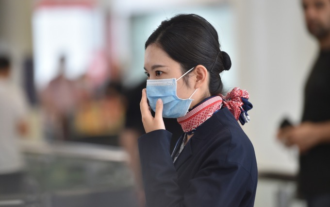 武漢入境南韓的追蹤調查結束 智庫發表景氣看法 (圖片:AFP)