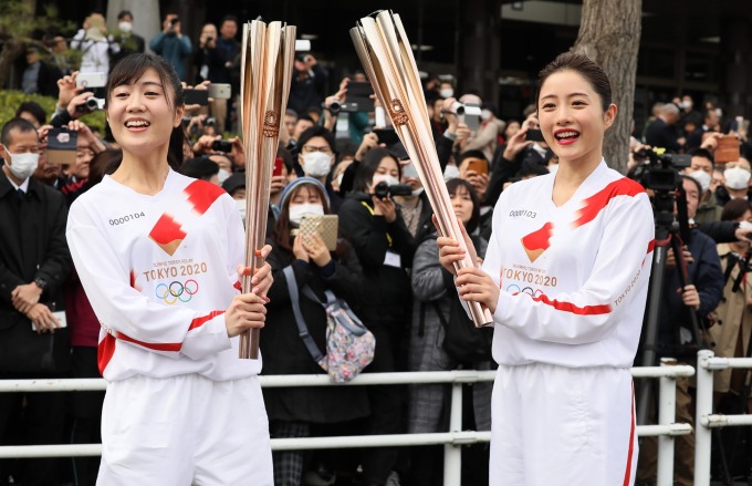 為了怕影響東京奧運,日本政府一開始採取「佛系防疫」。(圖片:AFP)