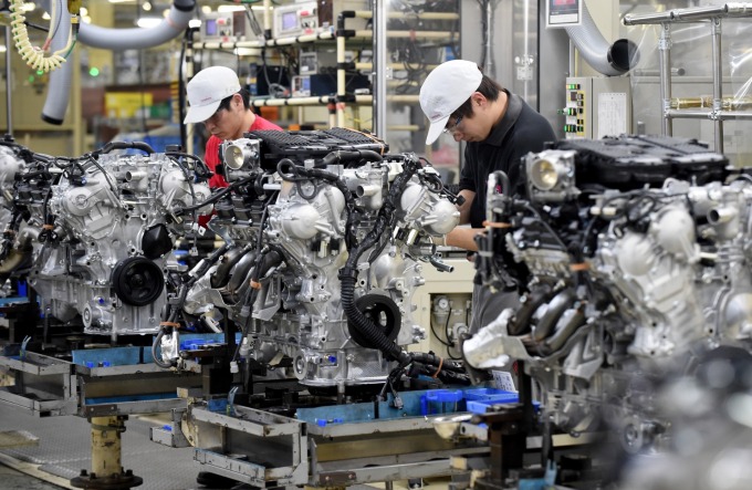 傳統燃油汽車的零件數量動輒上萬 (圖片:AFP)
