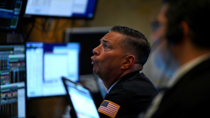 Fed意外降息 對ETF市場帶來什麼影響(圖片：AFP)