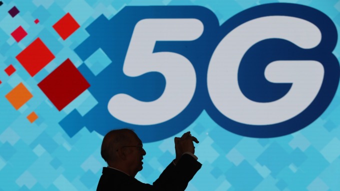 電信三雄5G資費戰正式開打。(圖:AFP)