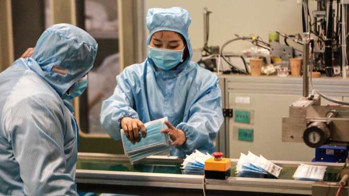 全球新冠病毒篩檢需求爆發 台廠搶上百億元商機。(圖:AFP)
