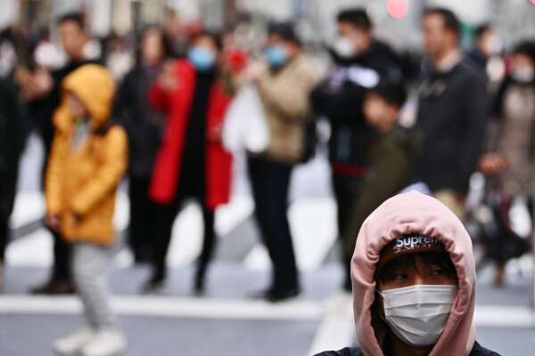 日本央行下修全國各地景氣判斷 (圖片:AFP)