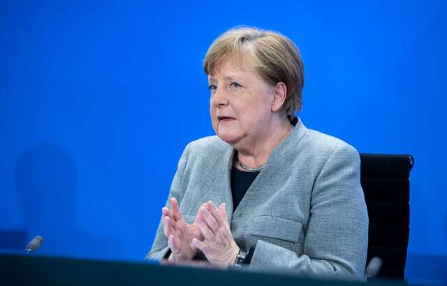 週三德國總理梅克爾 (Angela Merkel) 宣布逐步解封計畫 (圖片:AFP)