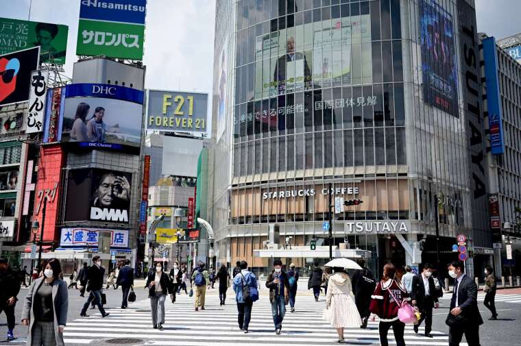 日本 39 縣最快 14 日解除緊急狀態 東京、大阪等還要再等等 (圖片:AFP)
