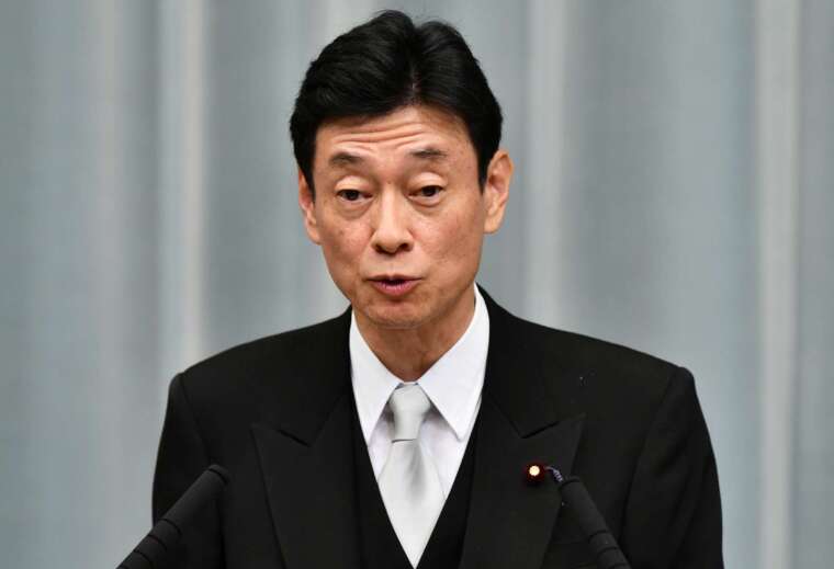 日本經濟再生大臣西村康稔 (圖片:AFP)