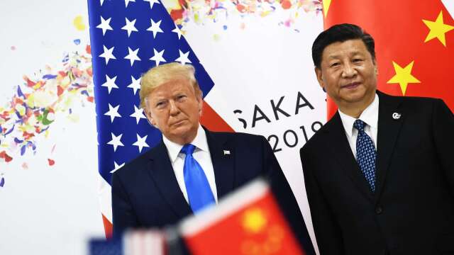 中美貿易戰2.0點火,手中持股停看聽。(圖:AFP)
