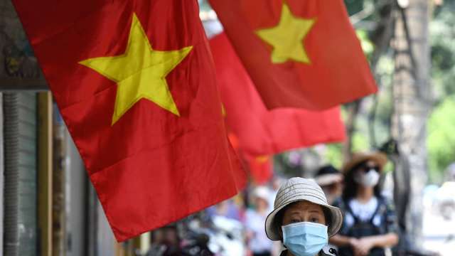 越南拉警報!恐遭美列匯率操縱國、課徵反補貼稅 (圖片:AFP)