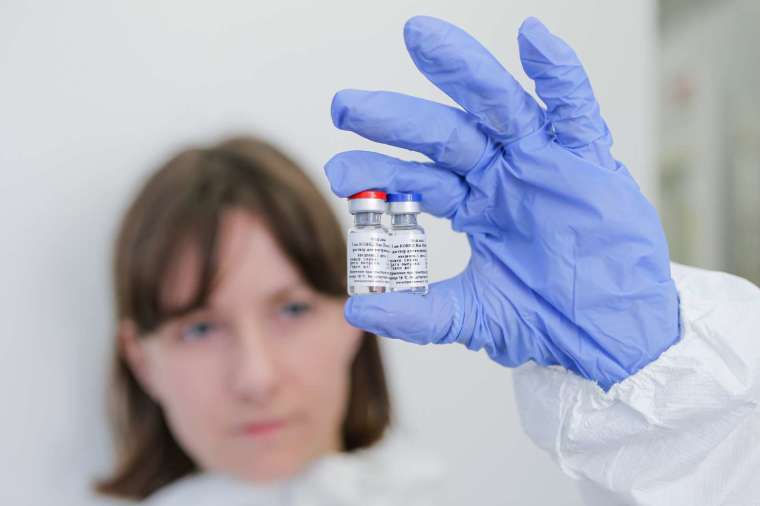 川普強調，今年底美國將提供數億劑疫苗 (圖片：AFP)
