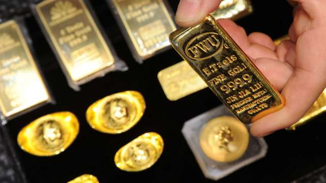 全球央行黃金購買創10年低點 預計明年回升(圖:AFP)