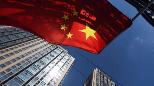 全球長期低利率前景下尋求高收益 貝萊德看好中國國內債券市場。(圖:AFP)