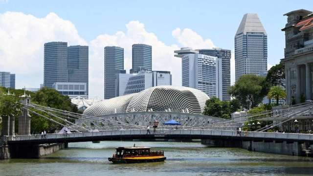 香港、新加坡旅遊泡泡計畫延後兩週 航空、觀光業受挫(圖:AFP)