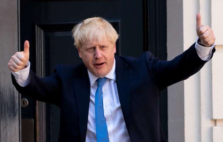 British Prime Minister Boris Johnson announced that the Great Blockade will be lifted in England on December 2 (Photo: AFP)